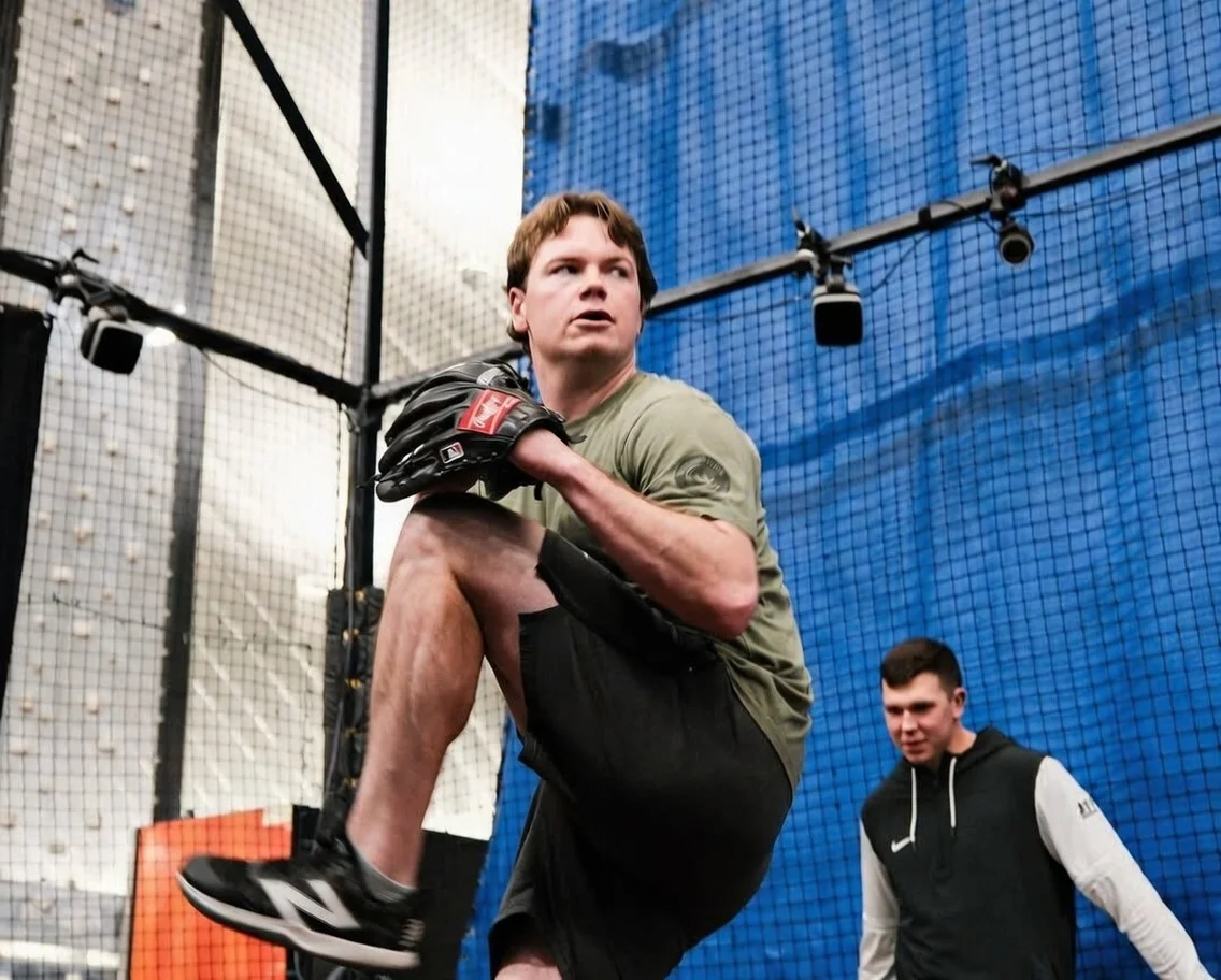 Baseball pitcher training at BSF Performance facility with Trackman data analysis