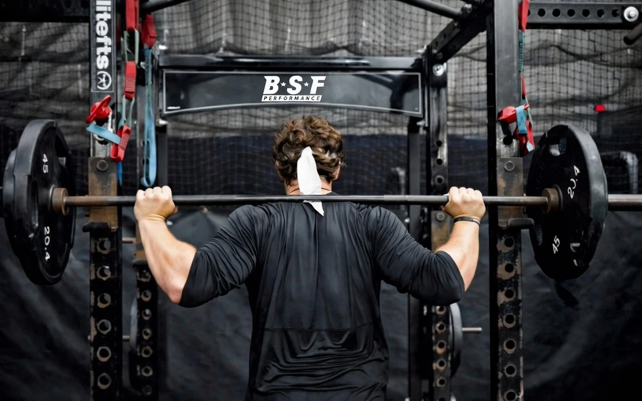 BSF Performance baseball training facility showing athlete performing strength and conditioning exercises in Lockport Illinois